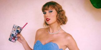 Taylor Swift performing with a backdrop inspired by Game of Thrones