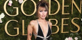 Why didn't Miley Cyrus react when her top fell on TV?