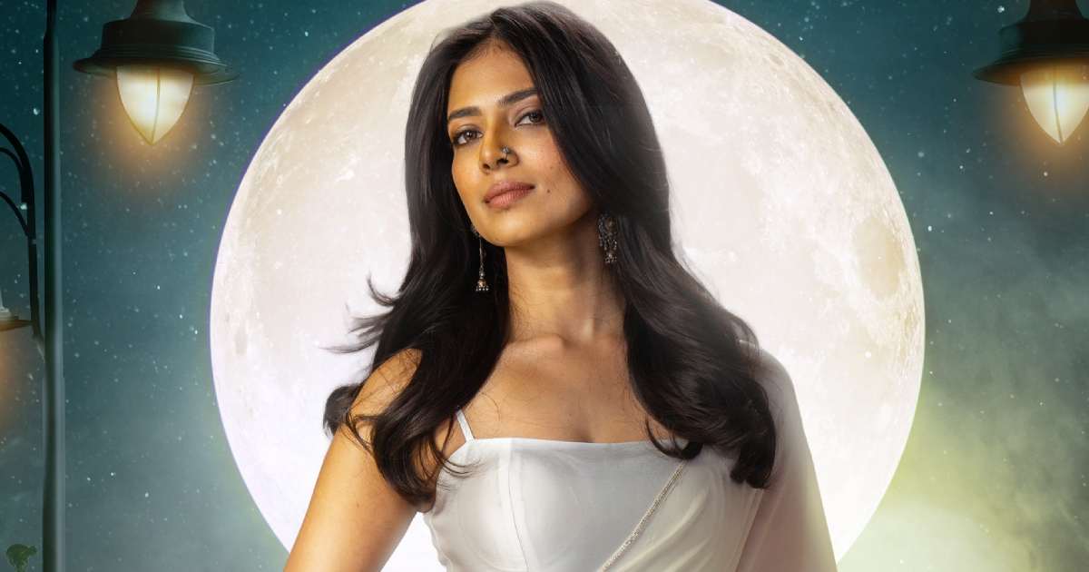 The RajaSaab: Malavika Mohanan Stuns In Pristine White Saree In First Look From Prabhas’ Movie